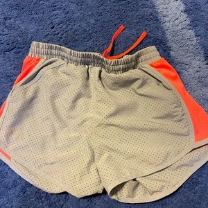 Under Armour tennis shorts, grey and bright pink